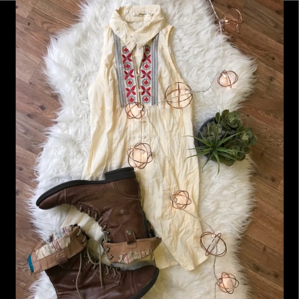 Sleeveless Tunic With Detailing
